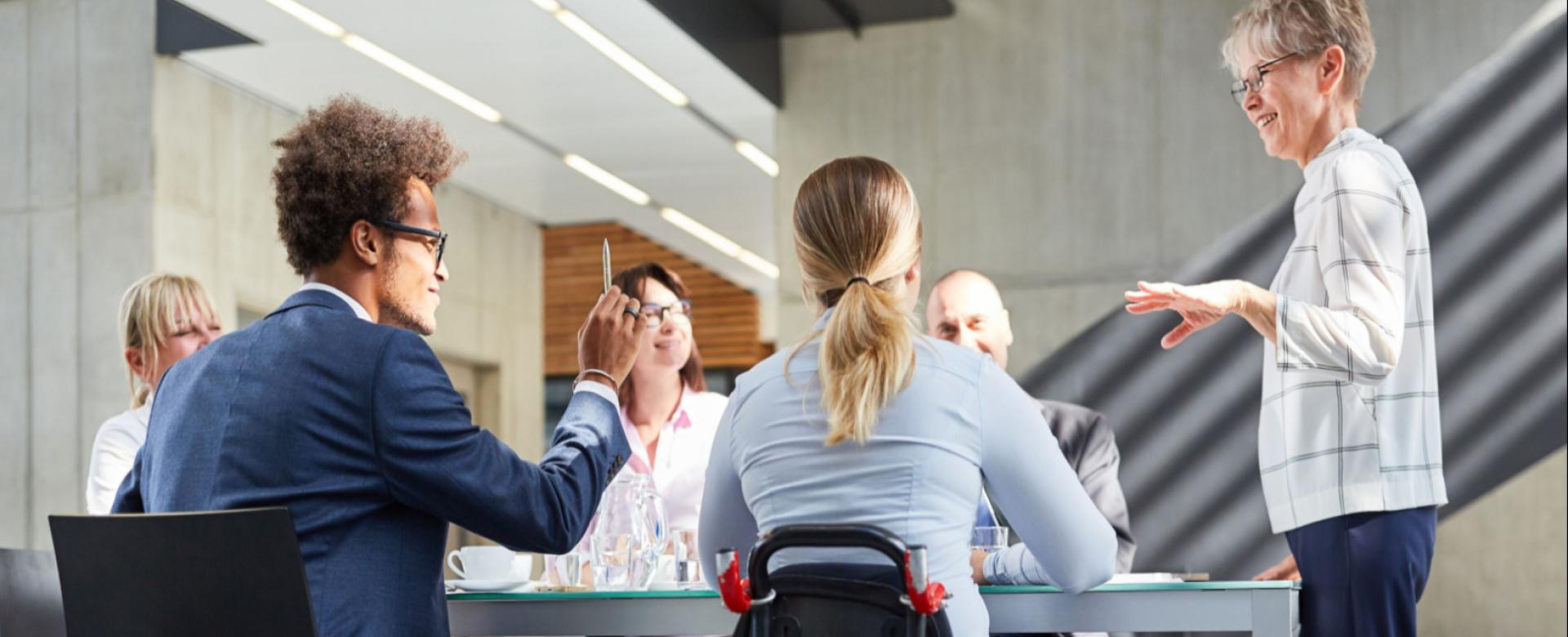 Men and Women Around a Table