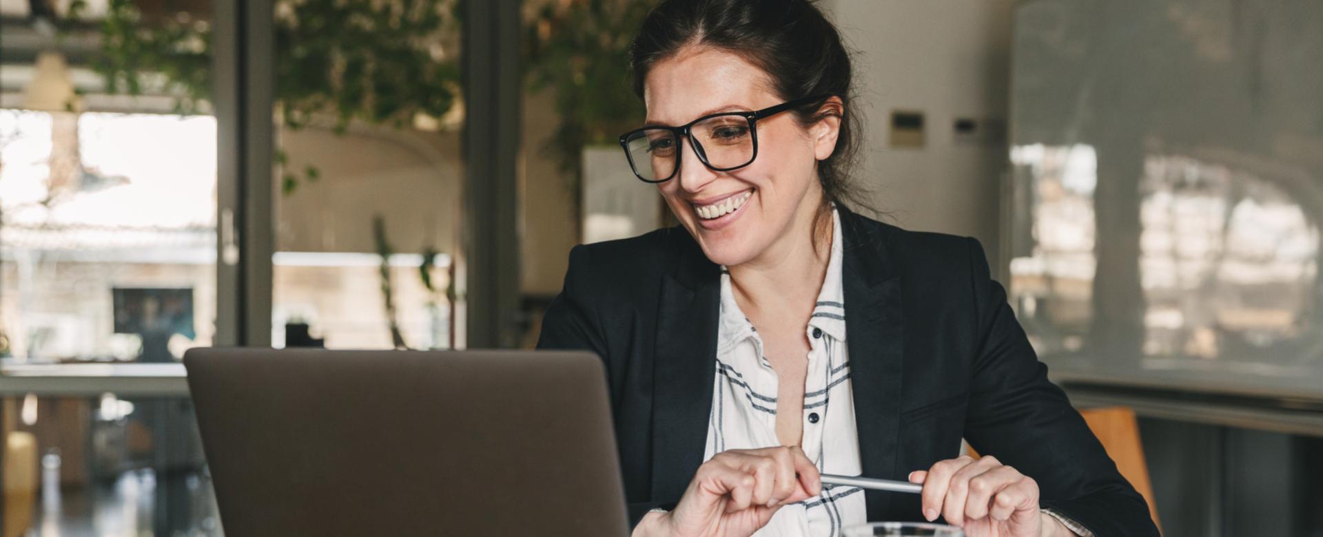 Woman Talking on Computer