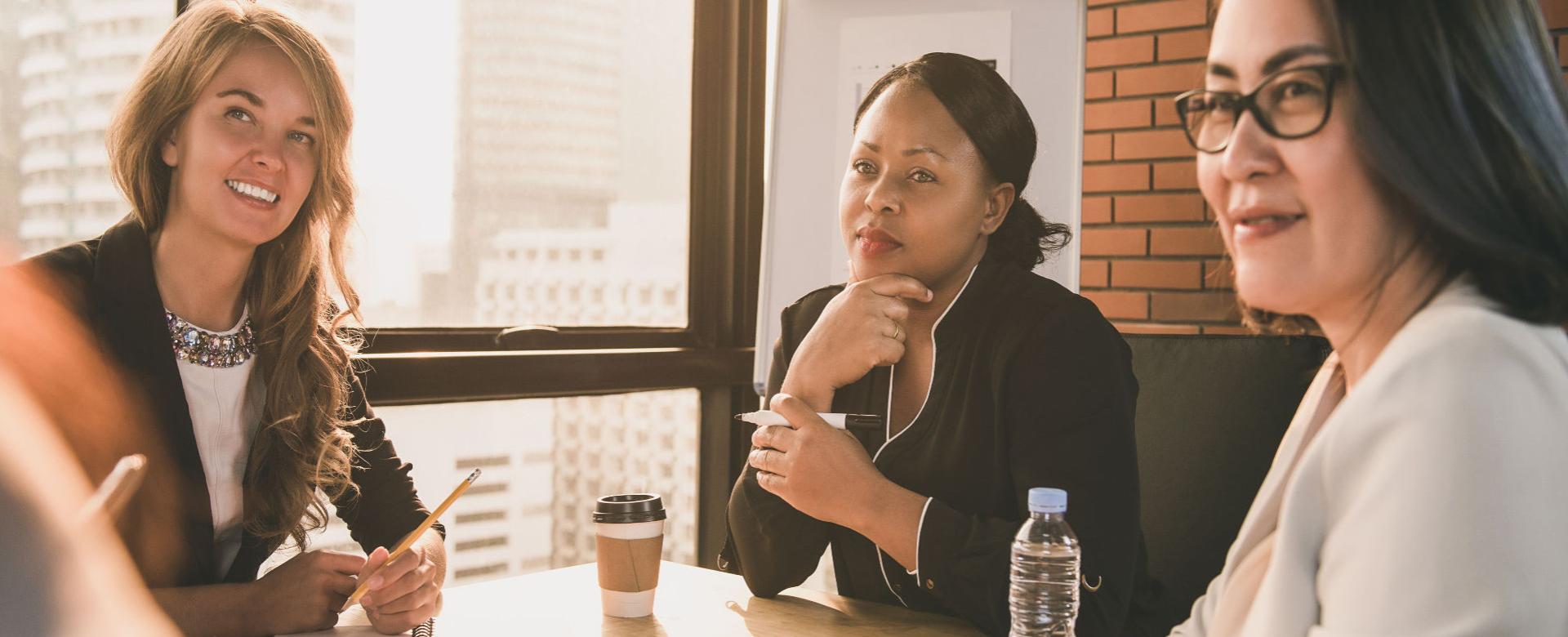 Women around a boardroom table