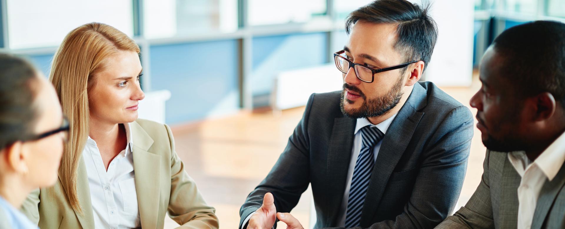 Coworkers having conversation