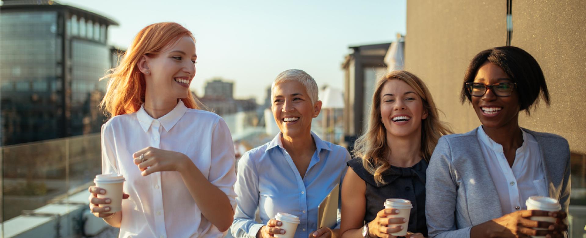 Female coworkers smiling