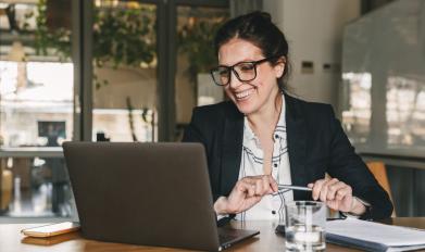 Woman Talking on Computer