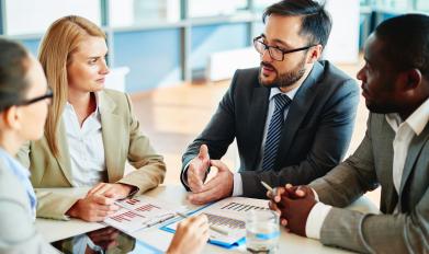 Coworkers having conversation