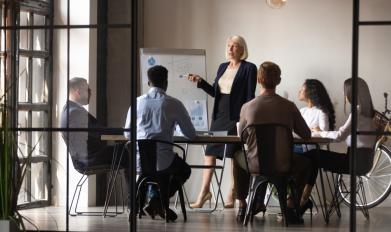 Women presenting to group